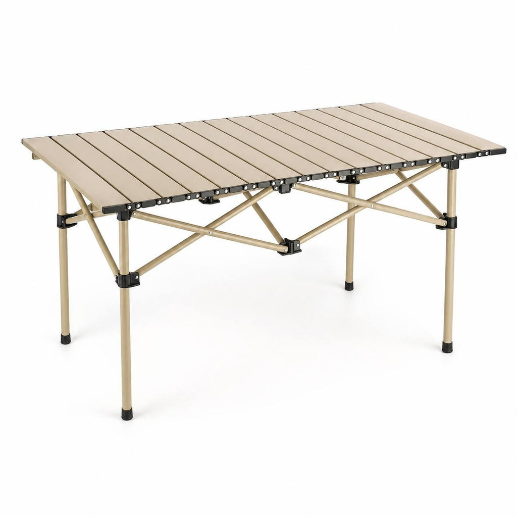 Beige aluminum roll-up folding camping table with X-frame support structure, isolated on a clean white background.