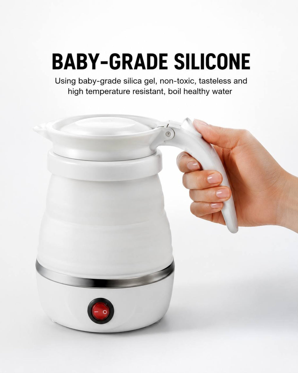 Close-up view of a hand holding the handle of the white collapsible kettle, emphasizing its baby-grade silicone material.