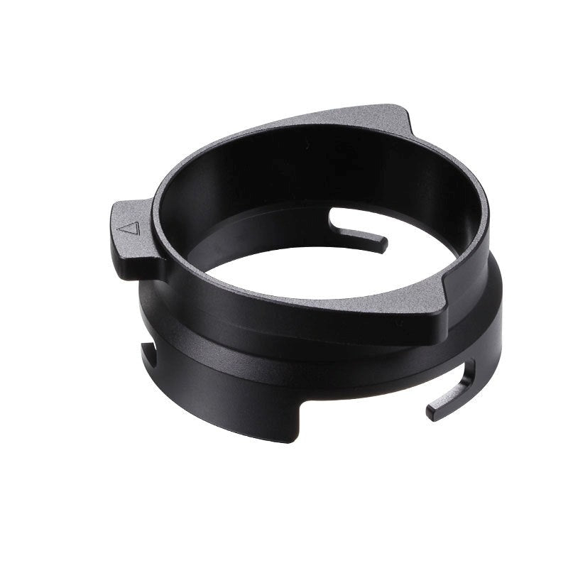 Black metal ring component on a white background
