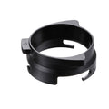 Black metal ring component on a white background