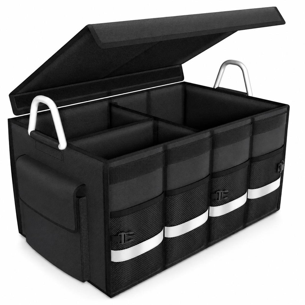 Studio product shot of a large black collapsible car boot organiser with an open lid, aluminum carry handles, mesh front pockets, reflective safety strips, and divided interior compartments against a white background.