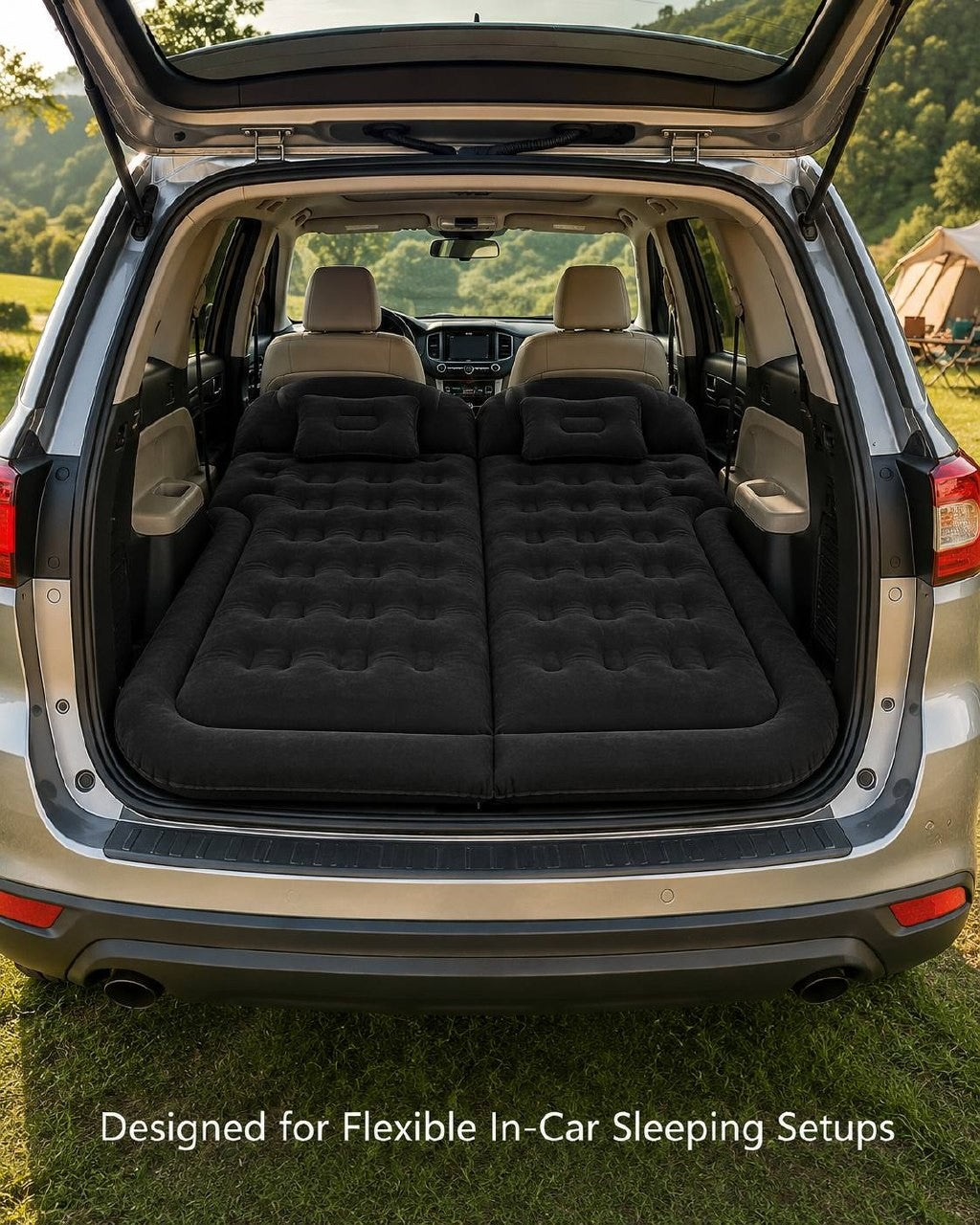 Black inflatable car mattress with pillows set up inside the rear trunk of an SUV parked on a grassy area.