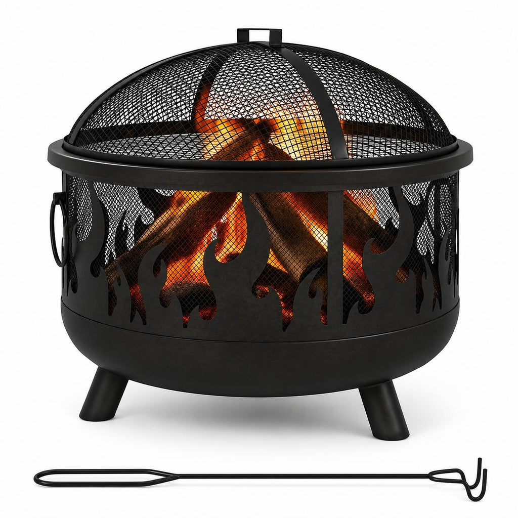 Black metal fire pit with a mesh spark cover, burning wood inside, and a metal fire poker placed in front on a white background
