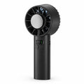 Studio product shot of a black portable handheld cooling fan featuring a digital display, control buttons, and a central cooling plate against a plain white background.