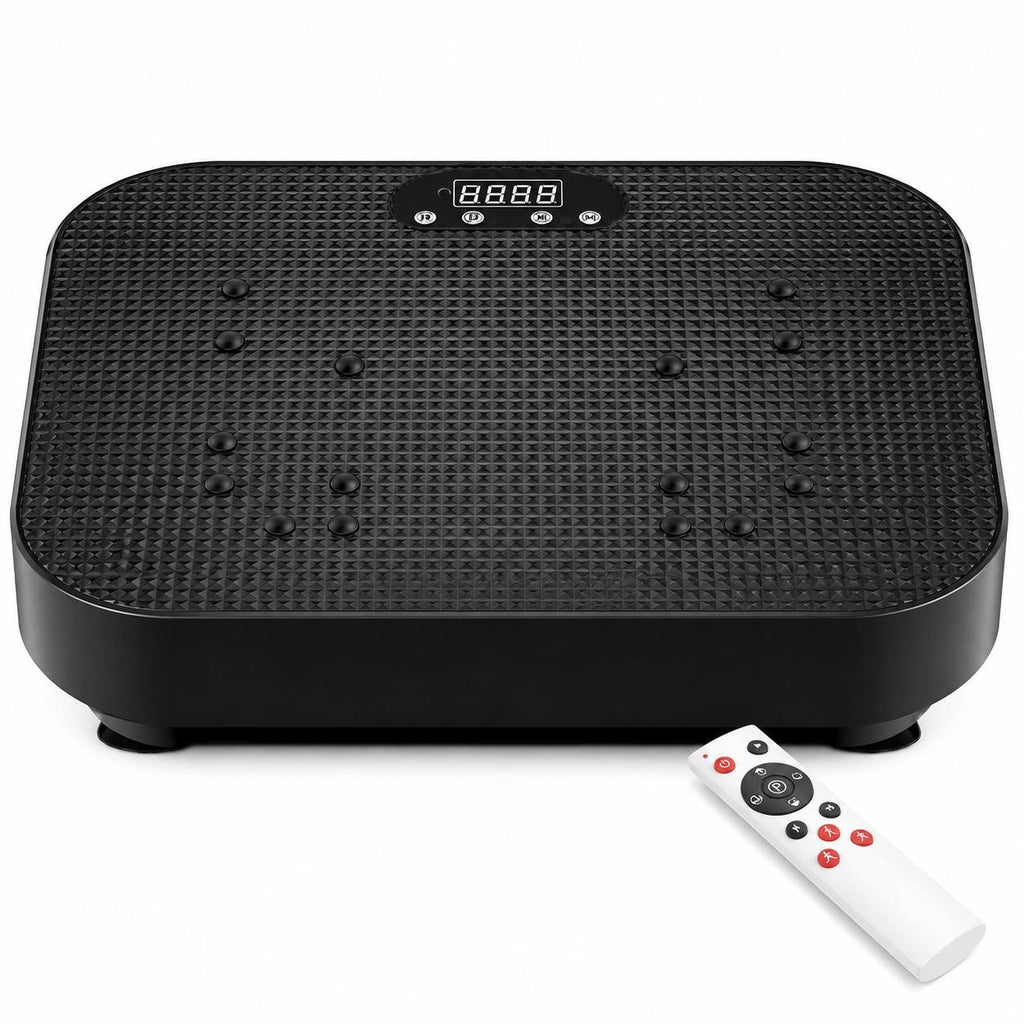 A black vibration plate exercise machine with a textured non-slip surface and digital LED display, accompanied by a white remote control on a clean white background.