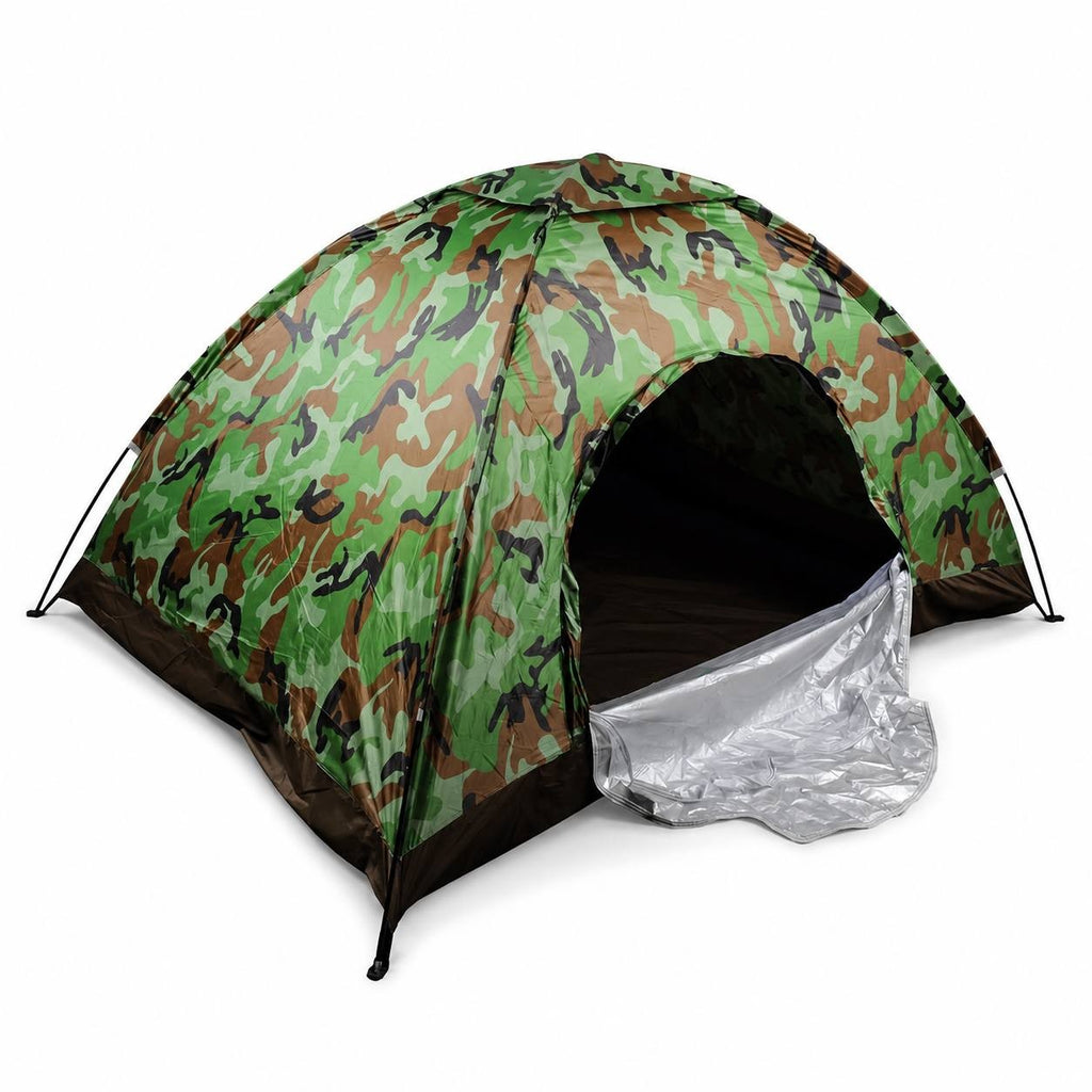 A dome-shaped camouflage camping tent set up on a carpet inside a bright living room next to a sofa and window.