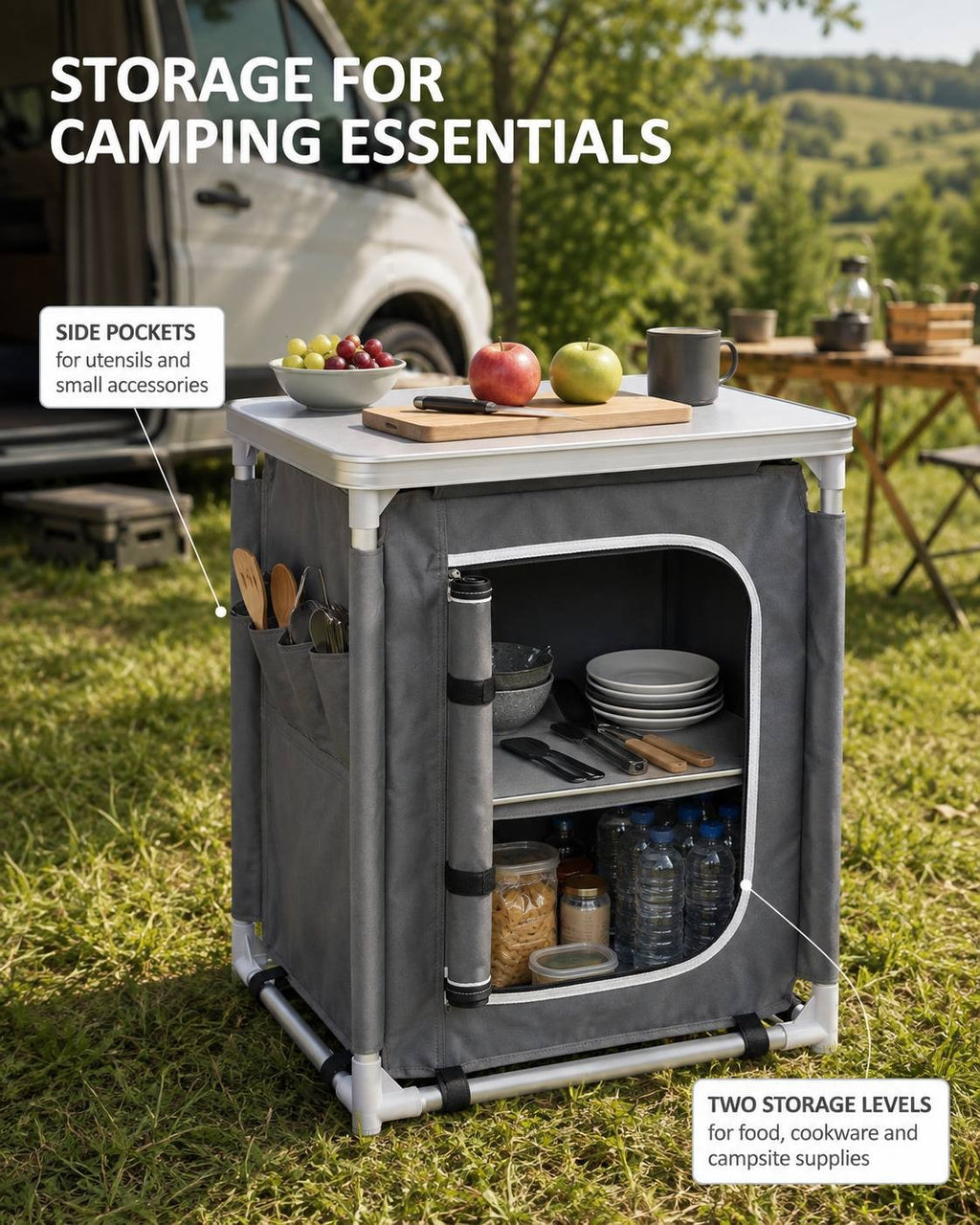 Grey camping kitchen cupboard with the fabric door rolled open, revealing two storage levels filled with tableware and food, plus side pockets for utensils.