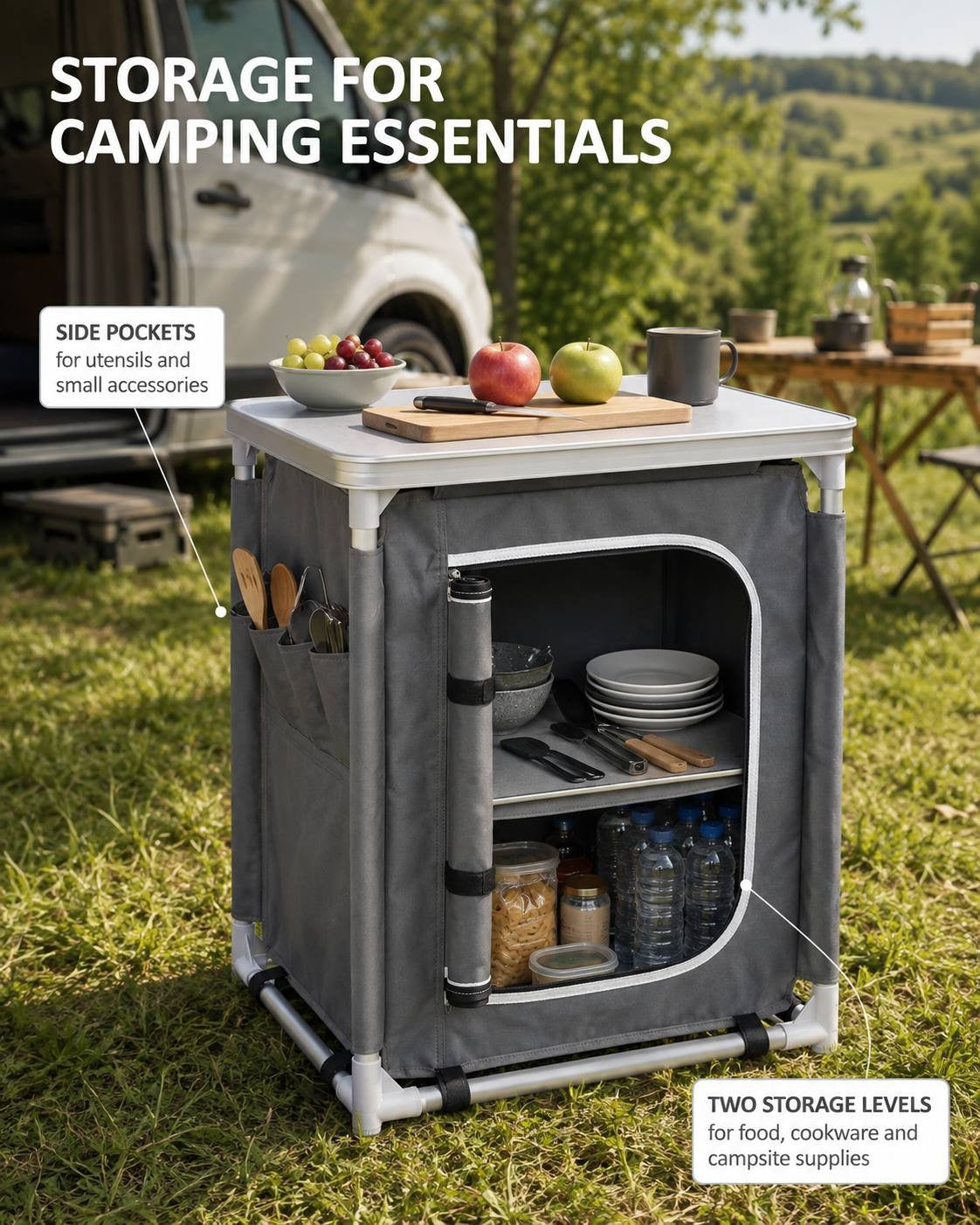 Grey camping kitchen cupboard with the fabric door rolled open, revealing two storage levels filled with tableware and food, plus side pockets for utensils.