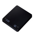 Black digital kitchen scale on a white background