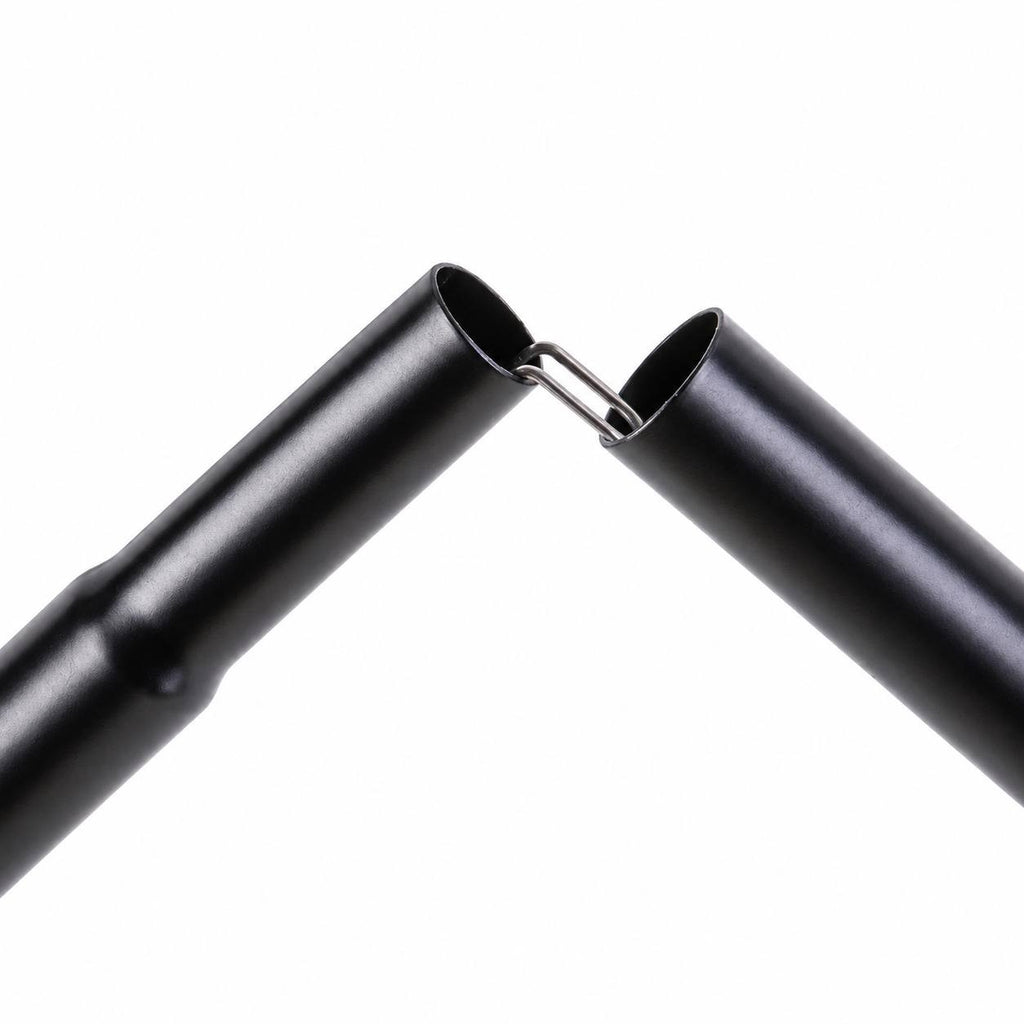 Close-up view of the internal elastic cord connection joining two black metal segments of a camping tent pole against a white background.