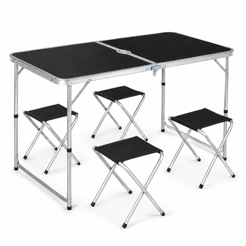 Folding camping table with a black top and aluminum frame, accompanied by four folding black stools, isolated on a white background.