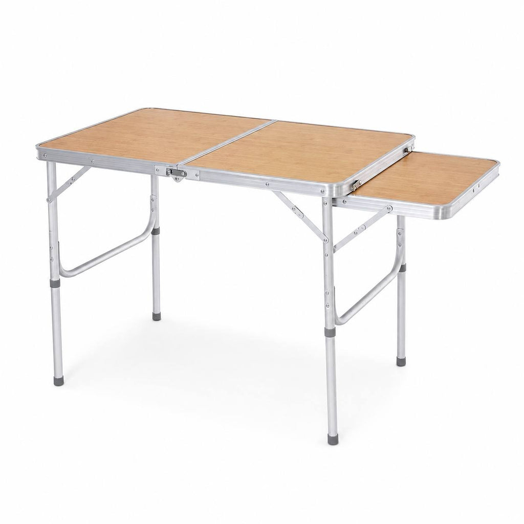 Folding camping table with a light wood grain top and aluminum frame isolated on a white background.