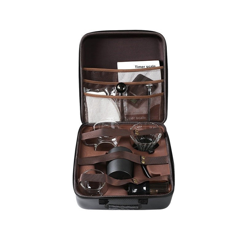 Open travel case with grooming tools and accessories on a white background