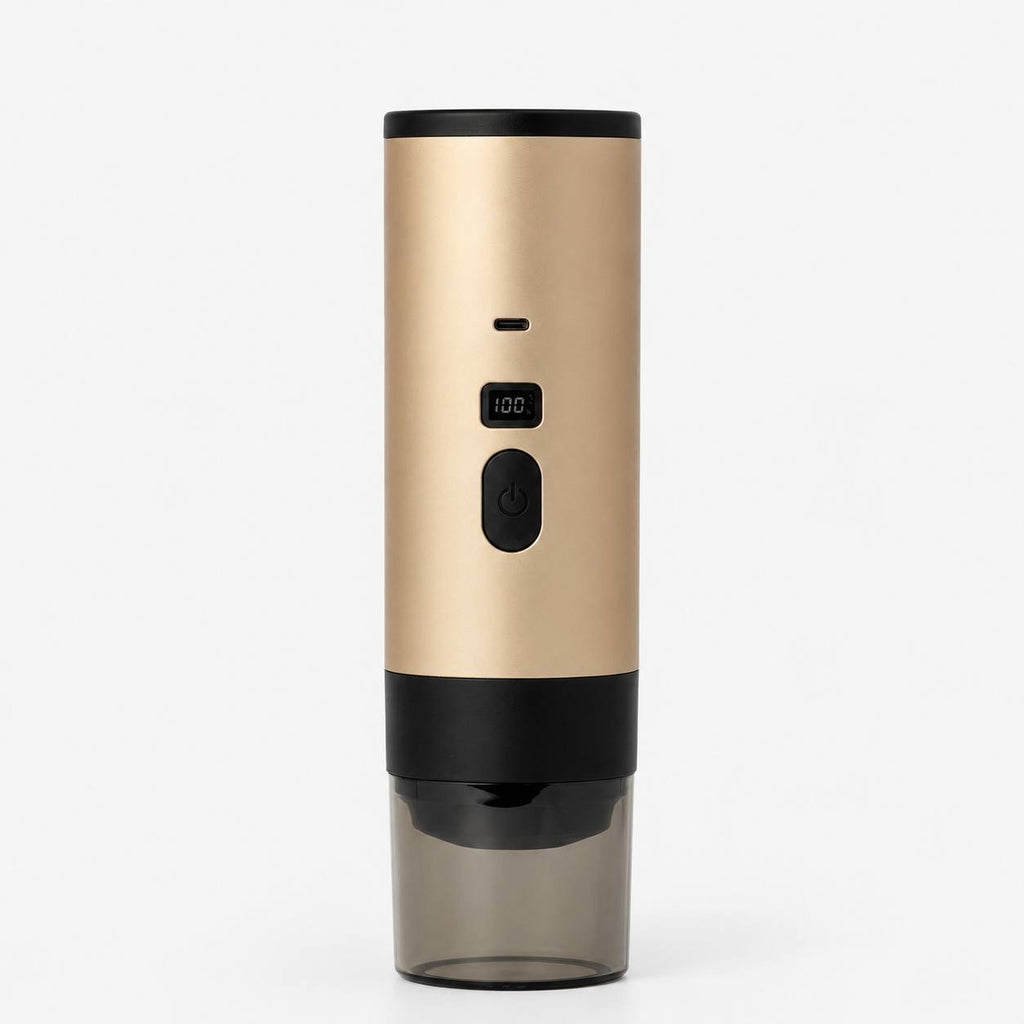 Gold and black electric wine bottle opener on a white background