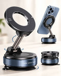 Studio product shot showing a black magnetic car phone mount with a vacuum suction base, adjustable folding metallic arm, and MagSafe compatible ring attached to a smartphone.