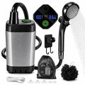 Complete portable camping shower kit with a grey water pump, shower head, digital control screen, charging cable, and accessories arranged on a light surface.