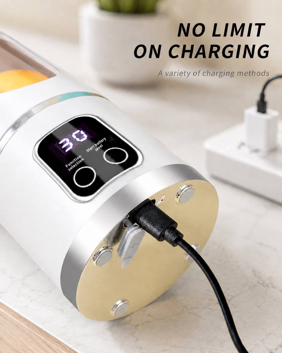 Close-up shot of the bottom base of a white portable cordless blender showing a USB charging cable plugged into the charging port on the metal base next to a wall charger.