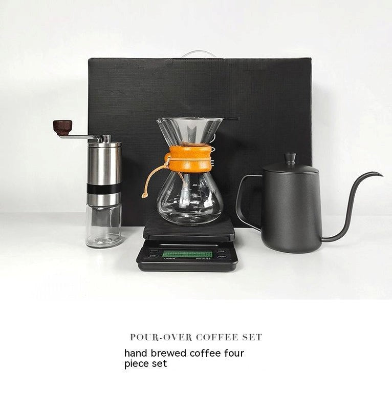Pour-over coffee set with various coffee-making tools on a white background